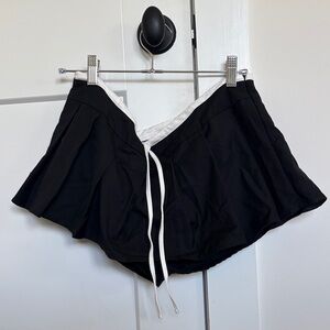Lioness Black Shorts with White Accents